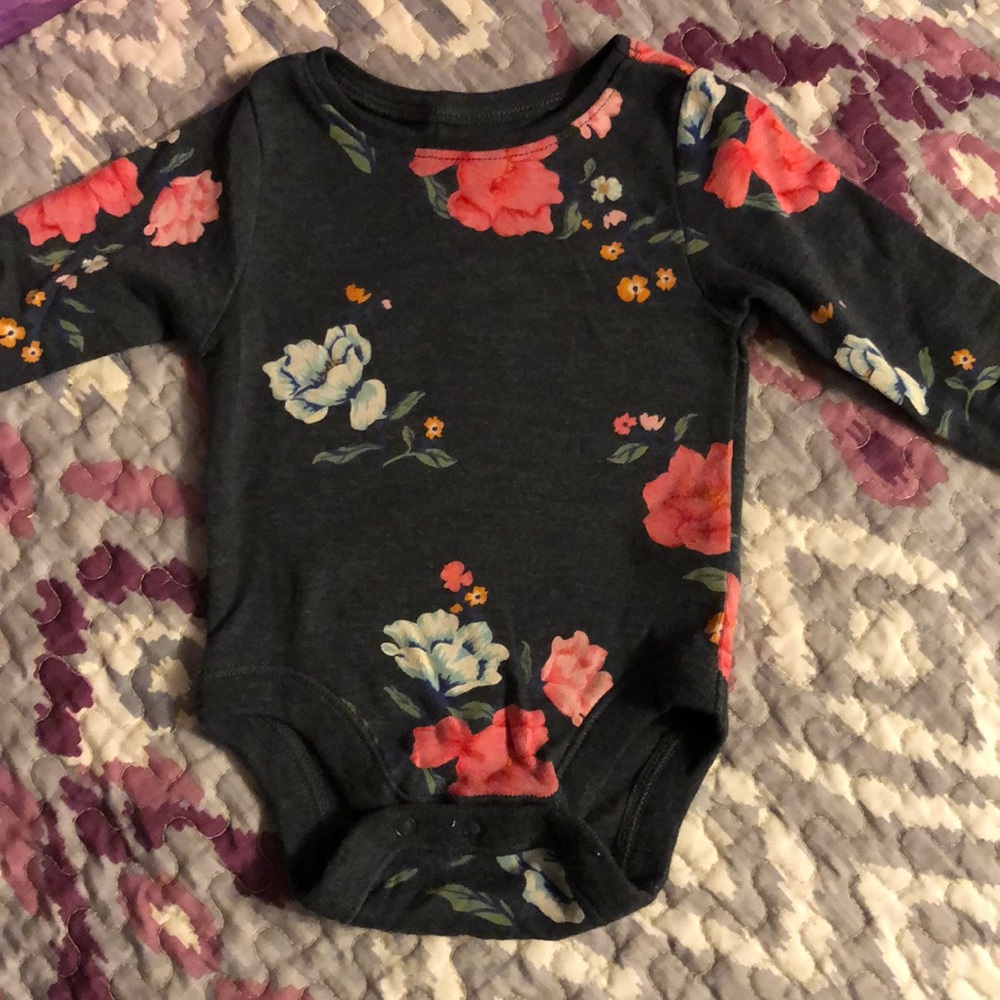 Floral long sleeved onesie